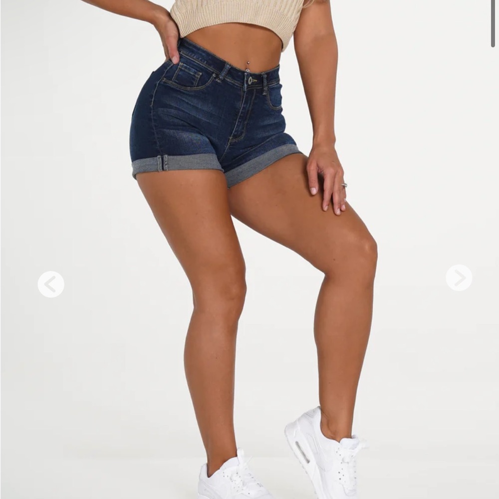 NVGTN. SOLD OUT ONLINE. BRAND NEW W/ TAG. Dark wash Jean shorts. Size M